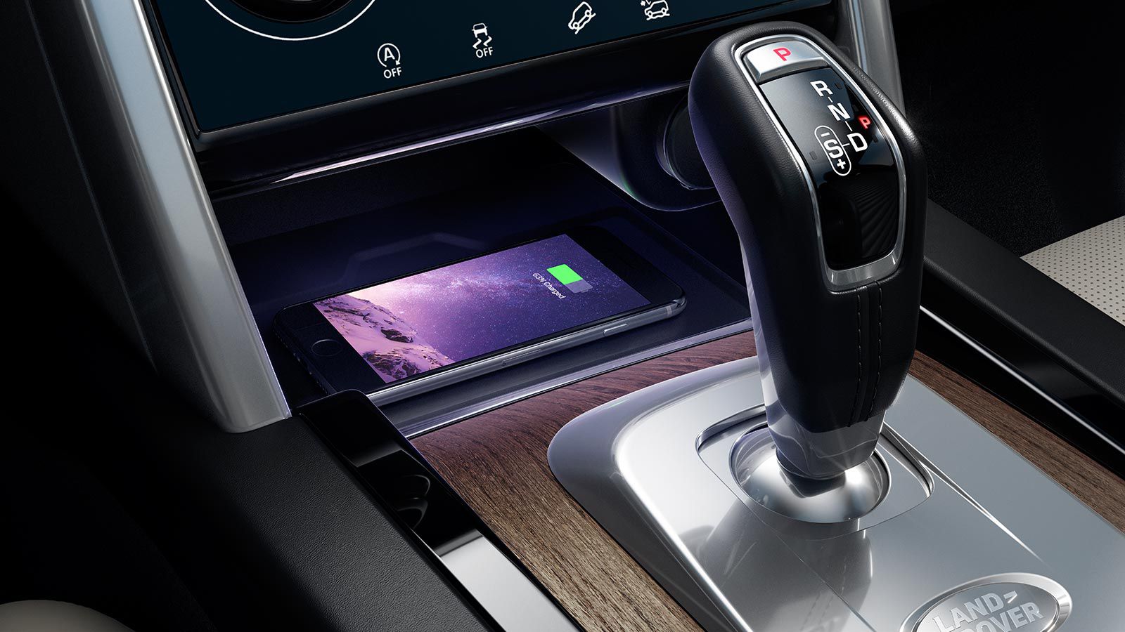 Для Discovery Sport доступна технология беспроводной зарядки.